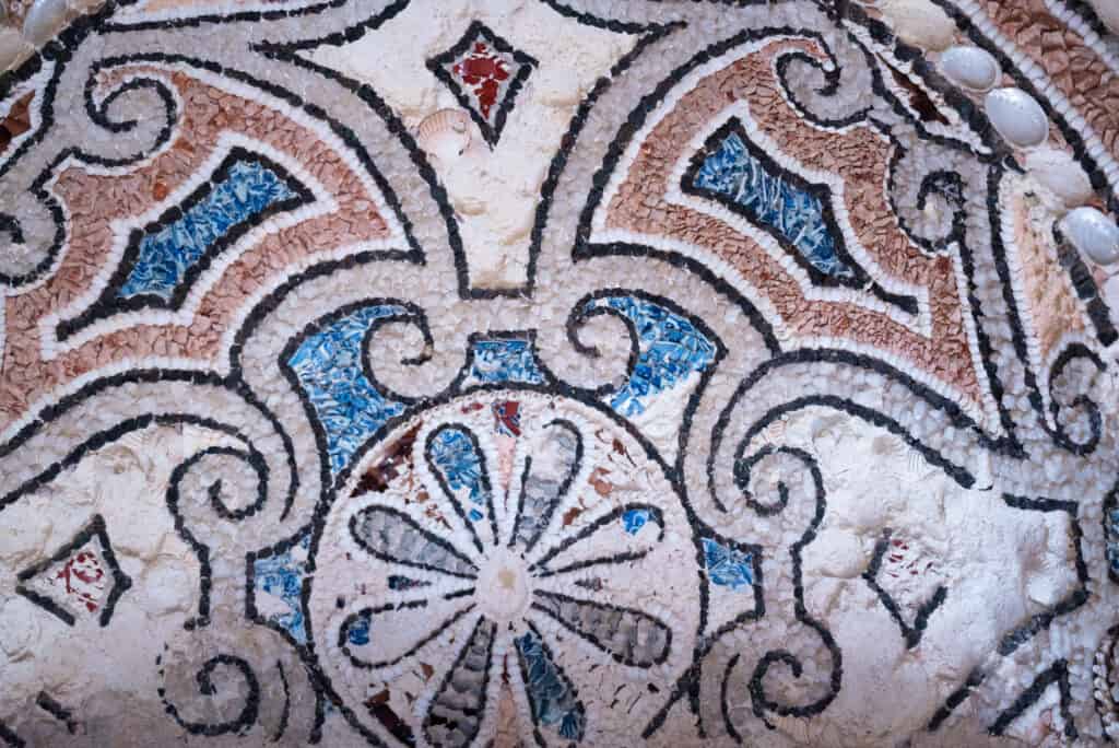 Red, Blue, and White shell mosaic with flower design