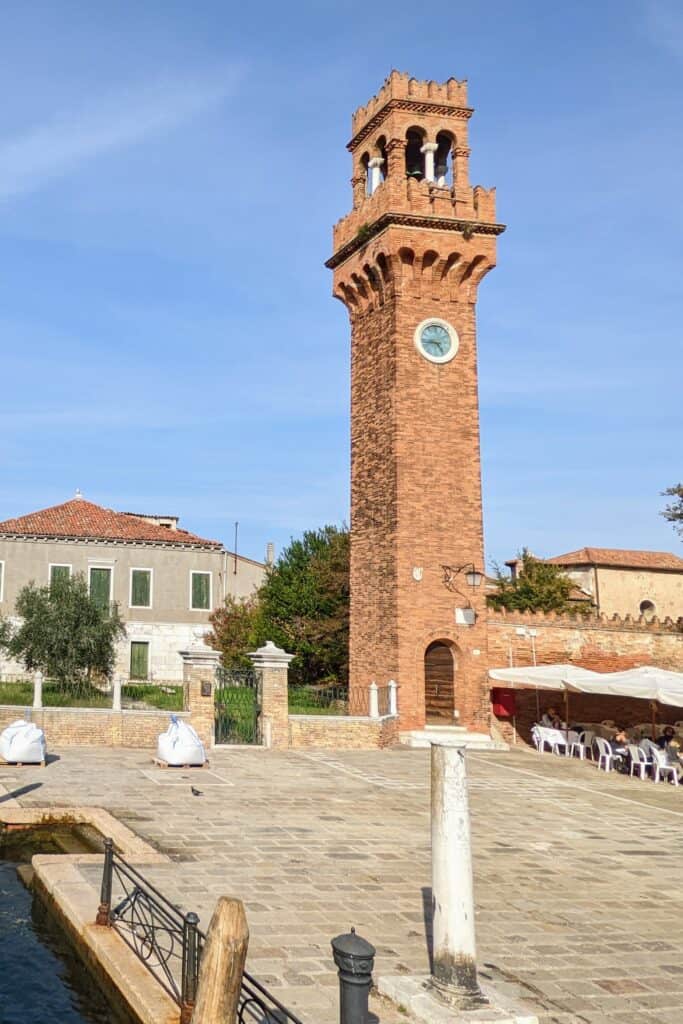 yellow-orange brick clock tower on Murano