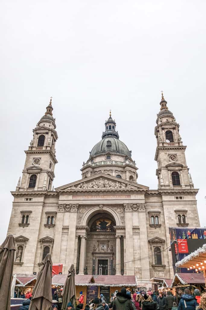 St Stephen's Basilica with advent markets in front Tower towers are on either side of the middle dome.