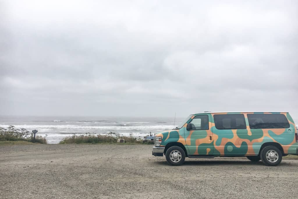 Yellow and teal painted van by the water on south beach