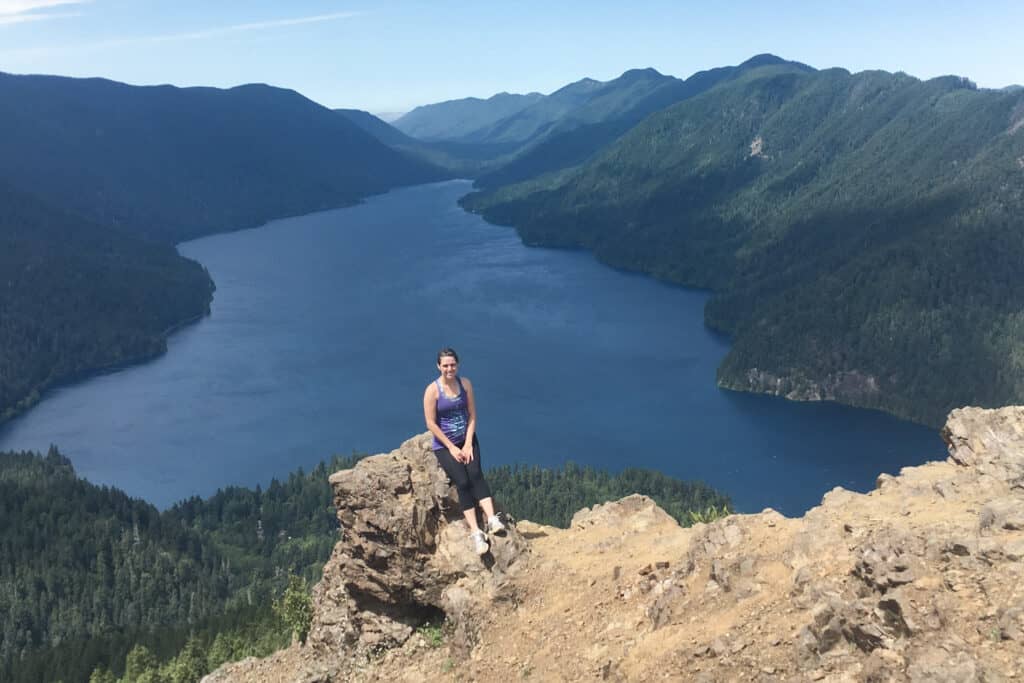 Jami at the top of Mt Storm King hike overlooking Lake Crescent