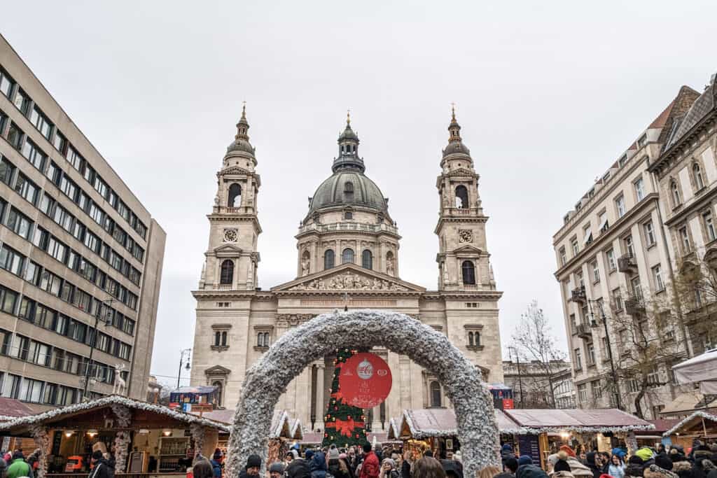 St. Stephens Basilica with Christmas tree, arch, and market stalls
