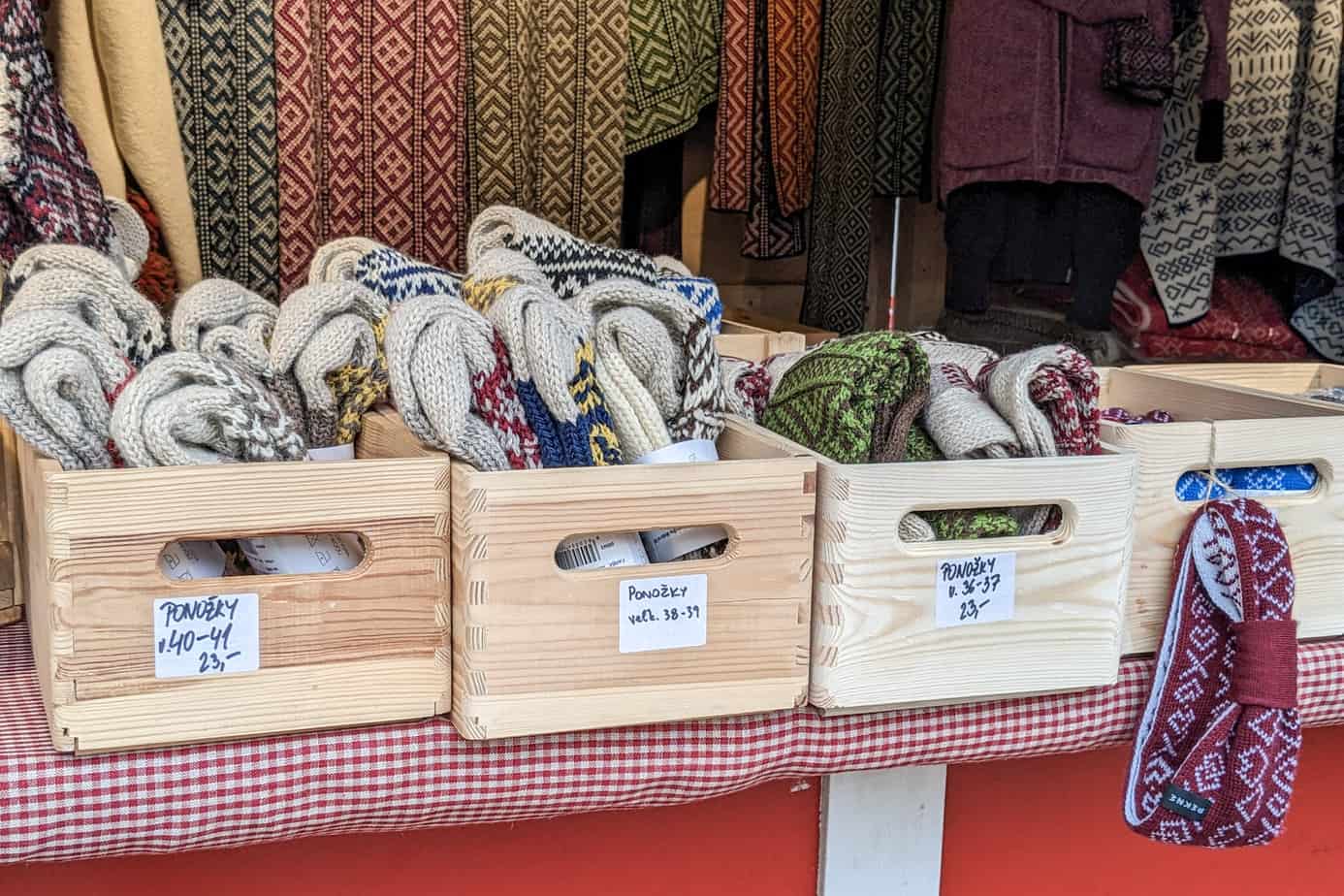 Knitwear in wooden bins in Bratislava