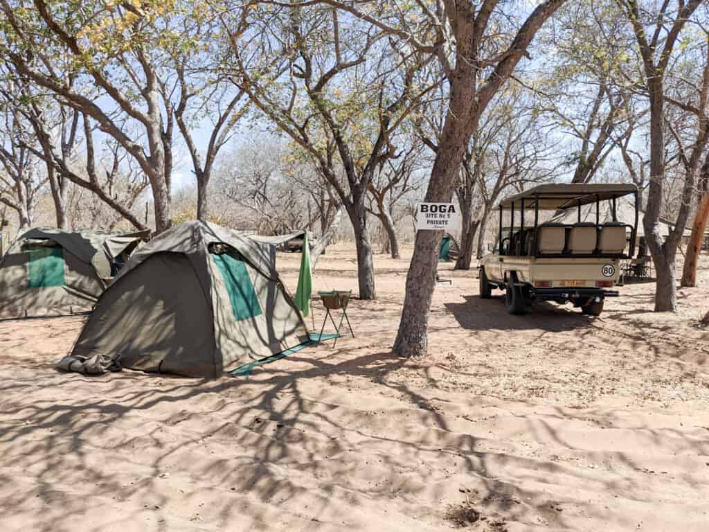 View of campsite in Chobe with safari jeep