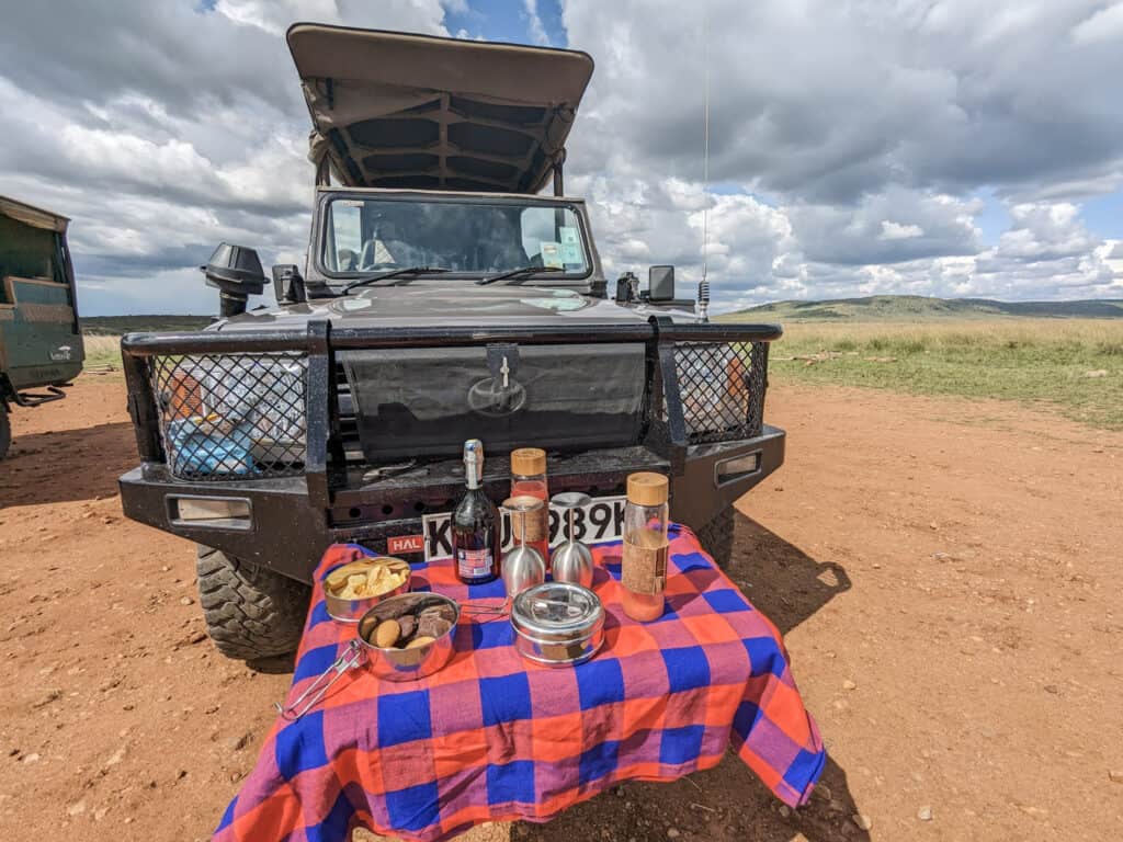 Masai Mara Jeep on Arrival in Keekorock. The front rack has snacks and drinks.