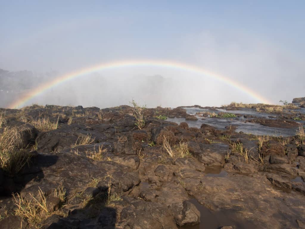 A rainbow off the edge of Victoria Falls